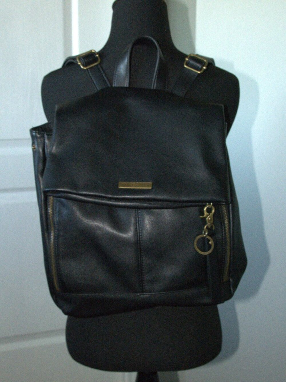 Frye & Co Polyurethane Backpack with a Flap Closure and adjustable size 13x11